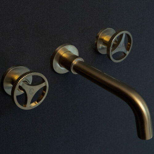 Unlacquered Brass Wall Mounted Faucet With Round Handles